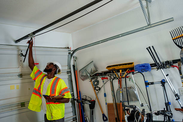 Professional Garage Door Panel Replacement technician working in Bucks County County, PA